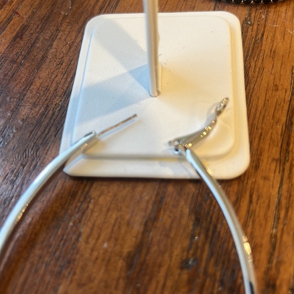 Large rhodium hoops with striking black Swarovski crystals. - Picture 5 of 7